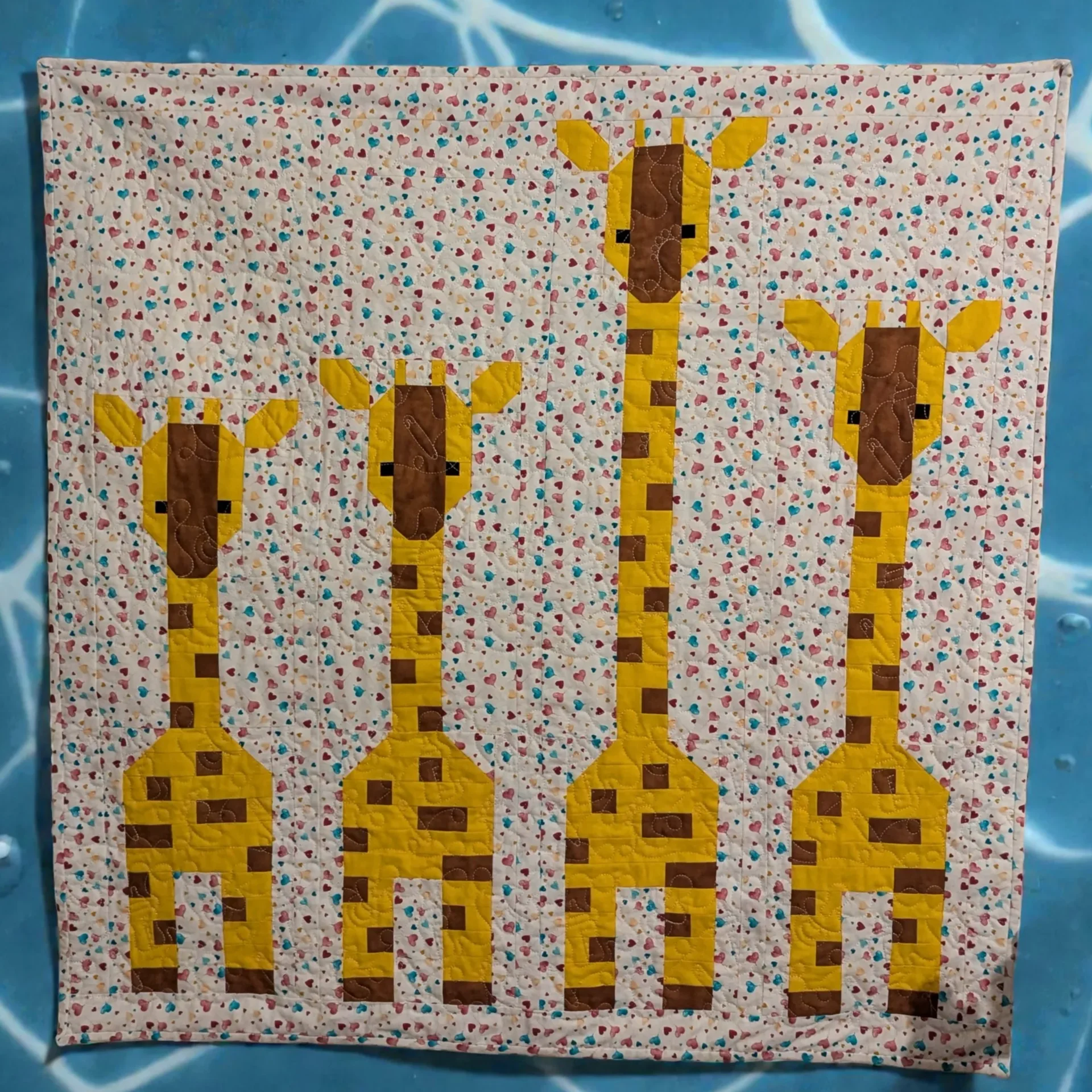 Babyquilt Giraffen in einer Reihe Hauptansicht